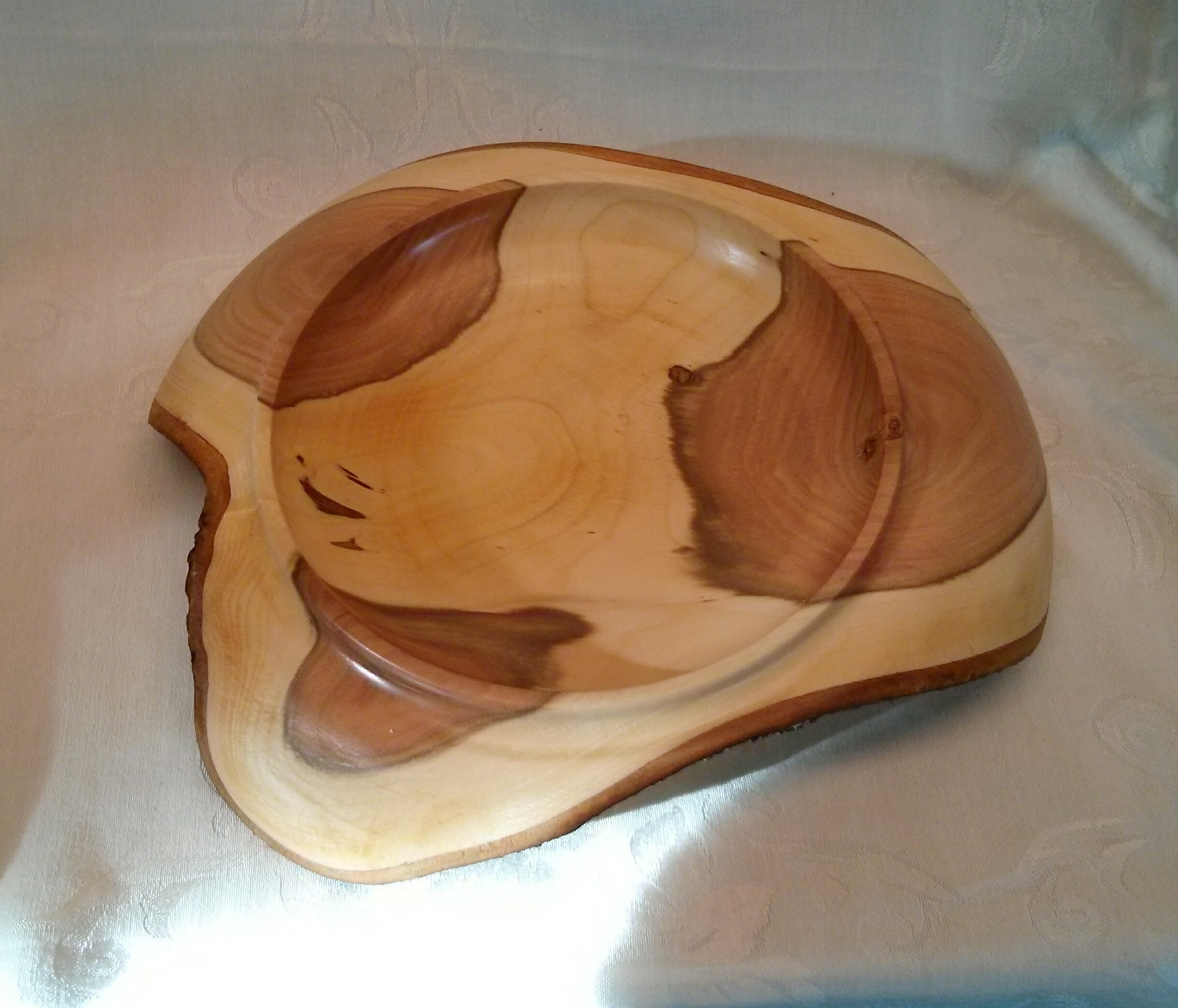 Suspended plum wood wing bowl 1