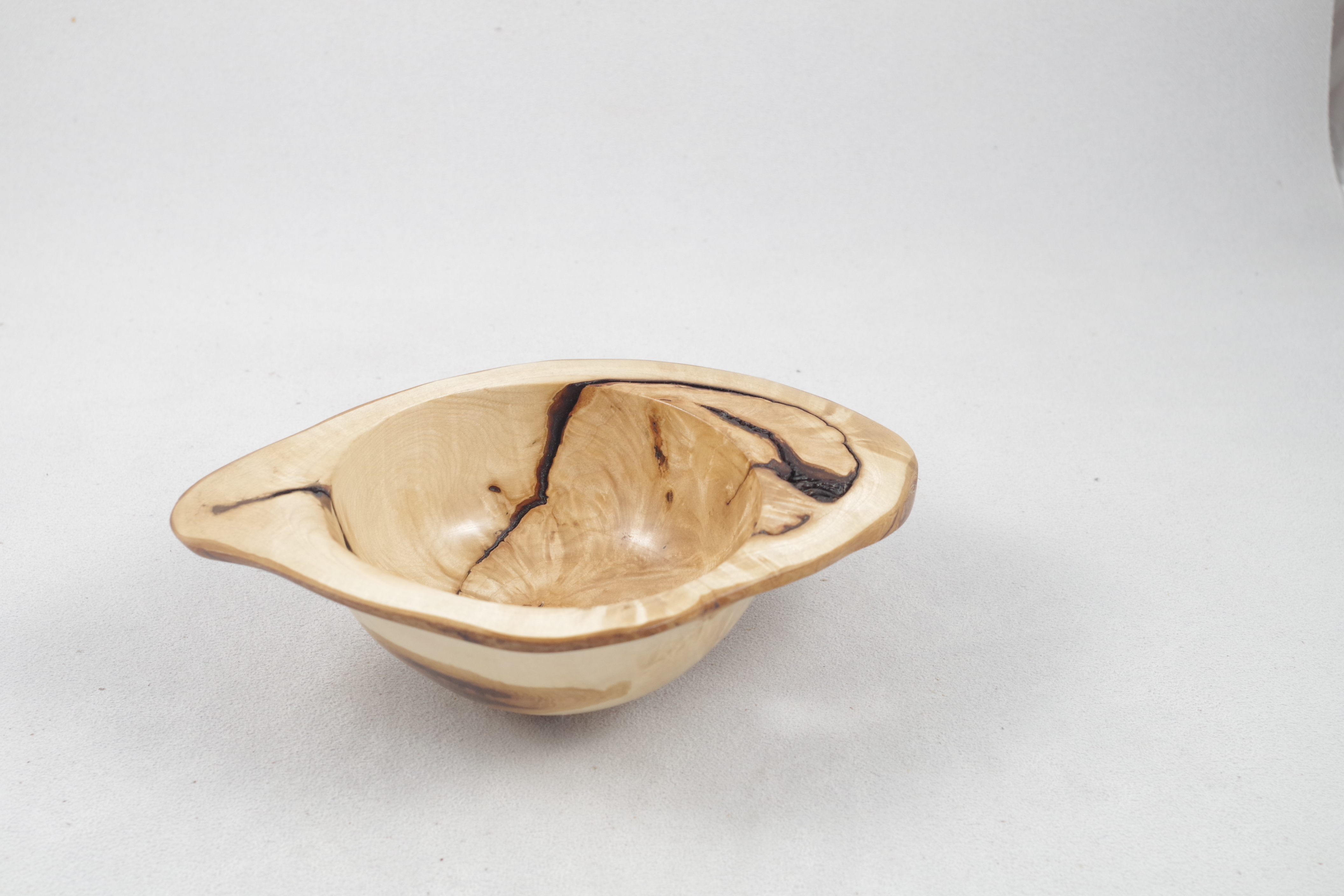 Natural edge burl bowl diagonal