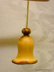 Plum wood Christmas bell ornament