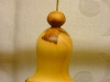 Christmas bell ornament made from plum wood