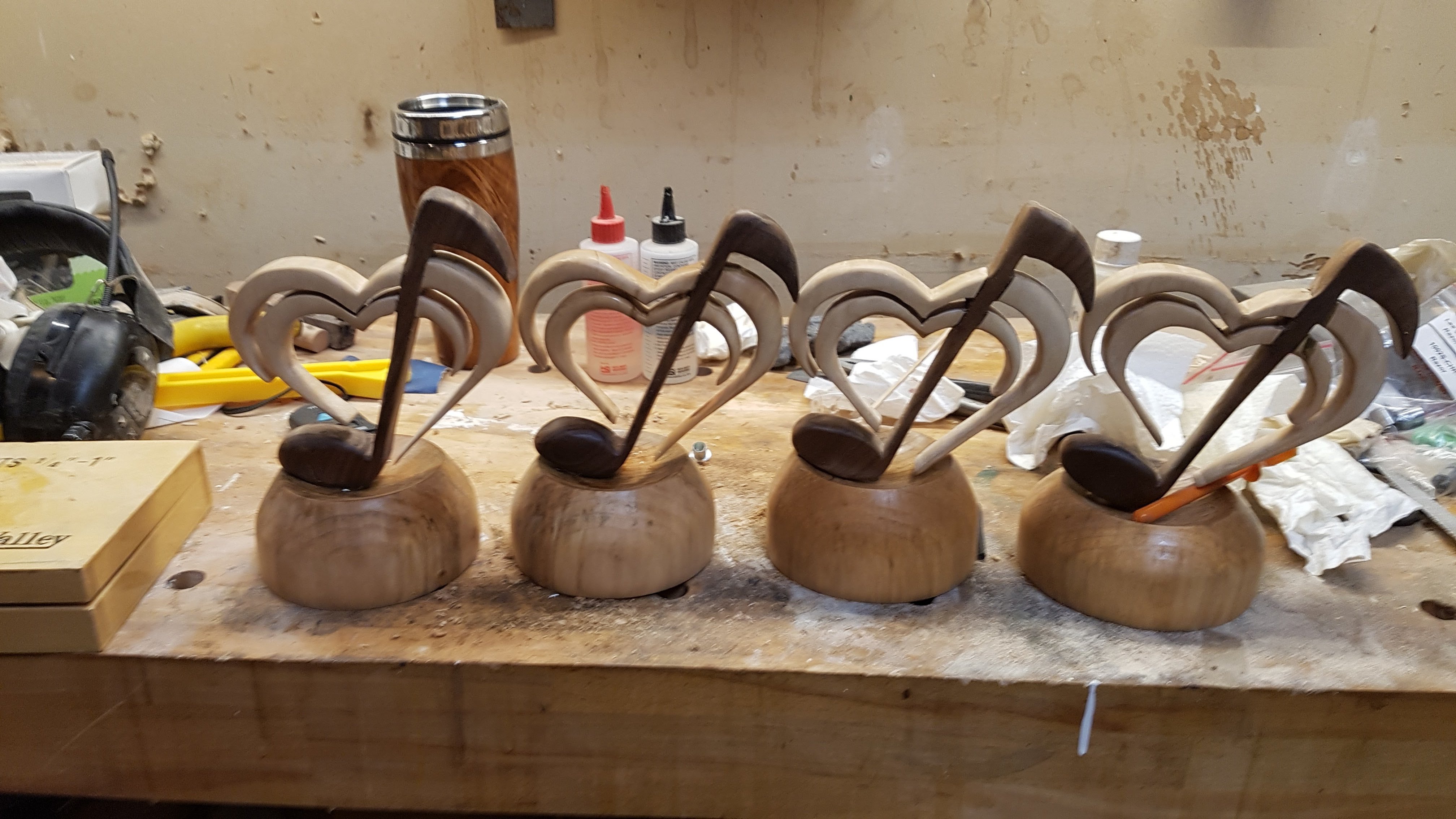 Assembled trophies on workbench